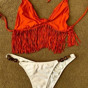Mix matched to piece swimsuit w/ Orange fringe top